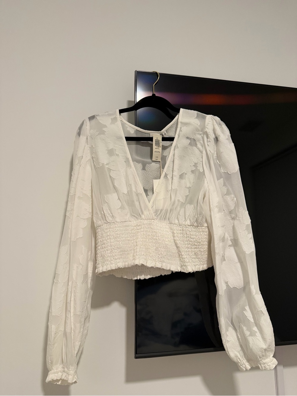 Aritzia White V-Neck Textured Floral Smocked-Waist Long Sleeve Top